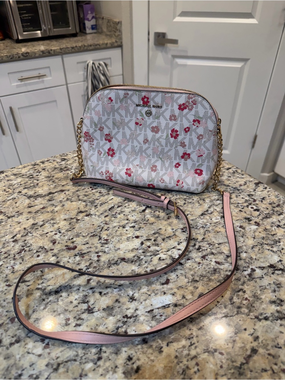 Michael Kors White Floral Logo Crossbody with Pink Strap